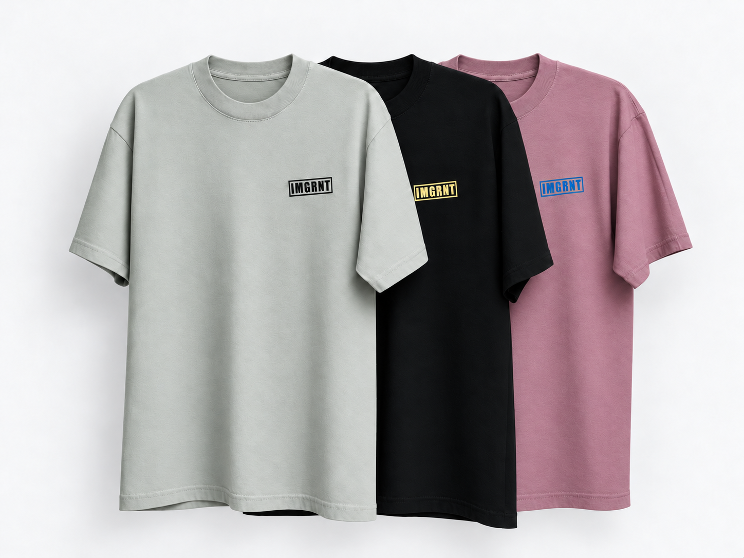 IMGRNT tees in gray, black, and pink